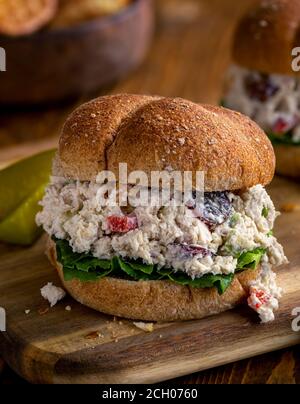Closeup of chicken salad sandwich with lettuce on a whole wheat bun Stock Photo