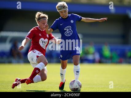Bristol City's Yana Daniels (left) challenges Chelsea's Ji So-Yun, resulting in a penalty, during the Barclays FA WSL match at Kingsmeadow Stadium, London. Stock Photo