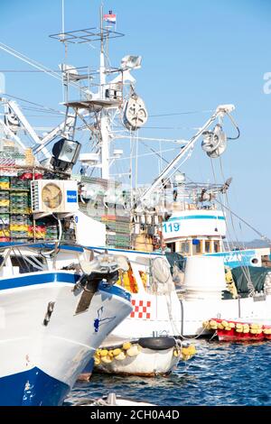 Long line fishing gear, containers with hooks inside a boat, equipment for traditional  commercial fishing technique in Adriatic sea Stock Photo - Alamy
