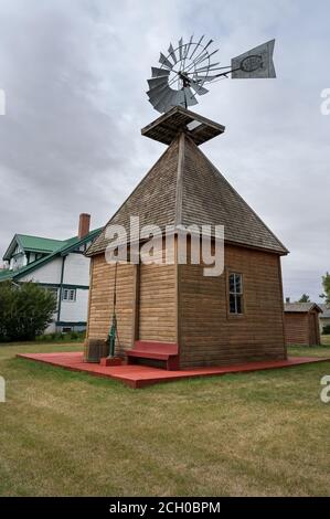 Delia, Alberta, Canada – September 08, 2020:  Historic wind powered grist mill on a street in the town of Delia Stock Photo