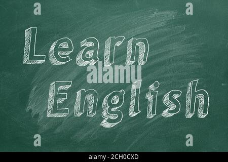 Hand drawing 'Learn English' on green chalkboard Stock Photo