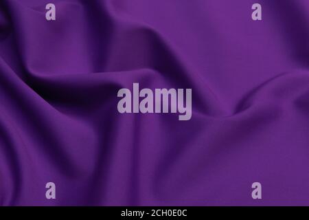 Purple fabric cloth texture for background and design art work, beautiful crumpled pattern of silk or linen. Stock Photo