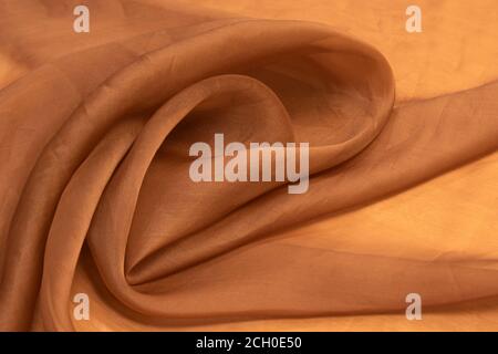 Brown fabric background silk, satin or organza. Stock Photo