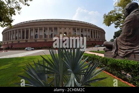 New Delhi, India. 13th September, 2020. A view of Indian Parliament House ahead of the Monsoon Session, in New Delhi.Parliament is fully prepared for the 18-day Monsoon Session from Monday, Sept. 14, 2020, under the shadow of the coronavirus pandemic with many firsts, including sitting of the two Houses in shifts without any off day, entry only to those having a negative COVID-19 report and compulsory wearing of masks. Credit: PRASOU/Alamy Live News Stock Photo