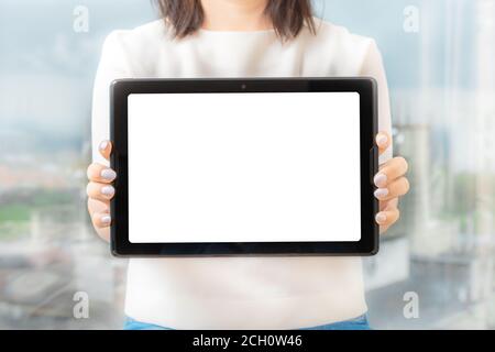 Women hold and digital tablet device, female hands show the tablet , front view, mockup Stock Photo