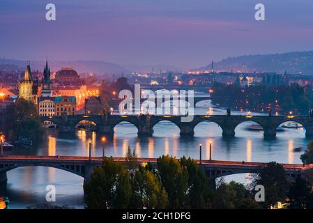 Beautiful Night View of the Bridges Crossing Vltava River in Prague, Czech Republic Stock Photo