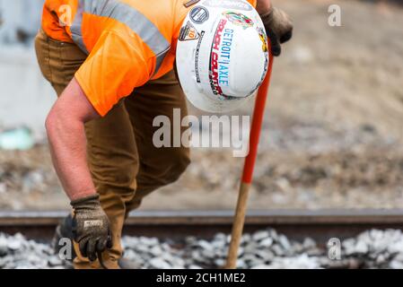 Keolis construction site, making repairs on the rails at Parker St. in Acton, Massachusetts. Stock Photo