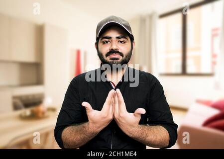 person with hearing disability communicating via sign language on video call Stock Photo
