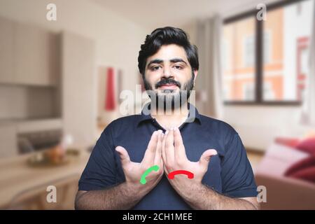 person with hearing disability communicating via sign language on video call Stock Photo