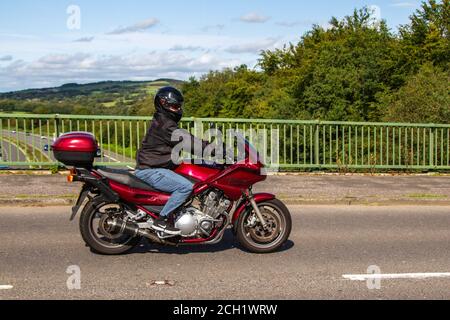 1998 red Yamaha XJ 900 S; Motorbike rider; two wheeled transport, motorcycles, vehicle, roads, motorbikes, bike riders motoring in Chorley, UK Stock Photo