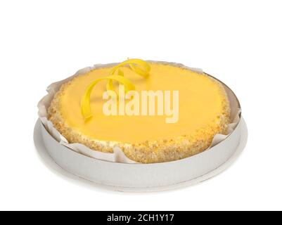 Sponge cake with cream and lemon cream on white background. Stock Photo