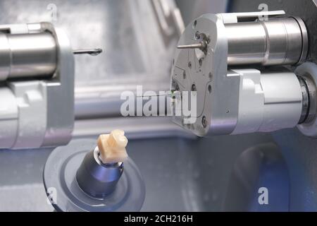 CAD CAM dental computer-aided machine. Digital modern dental laboratory ...