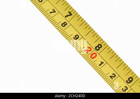 Yellow Measuring tape for tool roulette or ruler isolated on white background. Repair and construction concept Stock Photo