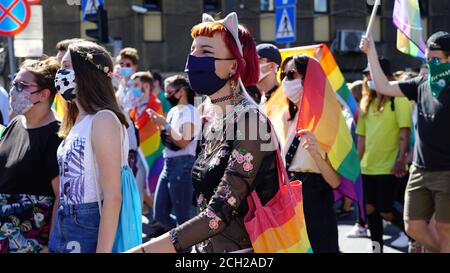 KATOWICE/ Poland - September 7, 2020: LGBT equality march. Young people wearing rainbow clothes are fighting for LGBTQ+ rights. Demonstration during c Stock Photo