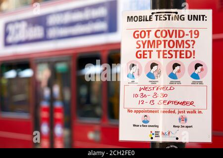 London, UK. - 13 Sept 2020: A notice offers local people in Shepherd's Bush community testing for coronavirus if they have symptons. Stock Photo