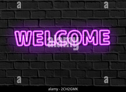 WELCOME - neon light entrance sign on brick wall Stock Photo