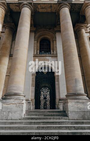 Oxford, UK - August 04, 2020: Low angle view of the entrance to the Clarendon Building, an early 18th-century neoclassical building of the University