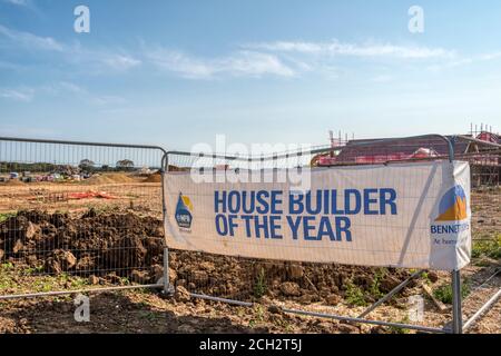 House Builder of the Year sign in front of Bennett Homes St Edmund's Park development.  New estate of houses on greenfield site on edge of Hunstanton. Stock Photo