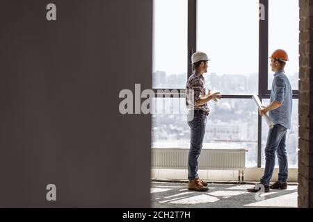 full length portrait. experienced architects taking part in the recunstruction of a new shopping mall. copy space Stock Photo