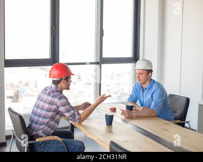 two friends are having conversation in coffee break Stock Photo