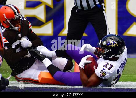 Jacksonville, FL, USA. 29th Nov, 2020. Cleveland Browns running back Nick  Chubb (24) is tackled by Jacksonville Jaguars cornerback Josiah Scott (24)  during 1st half NFL football game between the Cleveland Browns