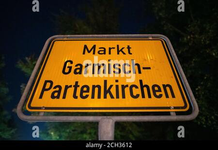Garmisch Partenkirchen, Germany. 13th Sep, 2020. The place-name sign of Garmisch. After a violent corona eruption in Garmisch-Partenkirchen in Upper Bavaria, it is still unclear what consequences the presumed perpetrator must expect. The authorities assume that the outbreak was caused by a so-called superspreader. Credit: Lino Mirgeler/dpa/Alamy Live News Stock Photo