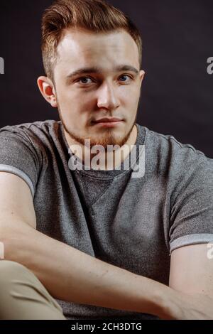 close up portrait of attractive red-haired male teenager. cropped photo Stock Photo