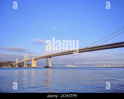 A view of the San Francisco Bay Bridge from the SF Embarcadero. Stock Photo