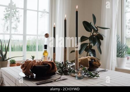 romantic dinner table set up for two at home Stock Photo