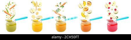 Many jars with healthy baby food and falling ingredients on white background Stock Photo