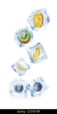 Set of ice cubes with different berries and fruits on white background Stock Photo