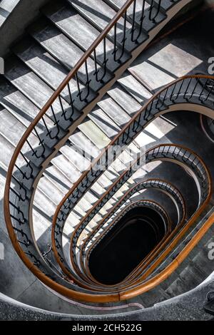 Looking down at the spiral staircase Stock Photo