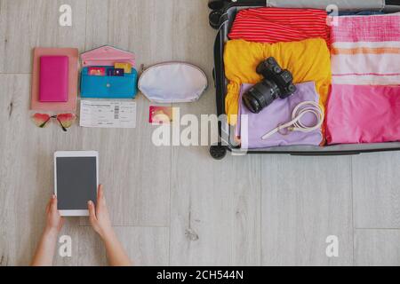 Woman planning vacation, top view Stock Photo