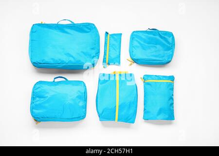 Set of travel organizers for belongings on white background Stock Photo