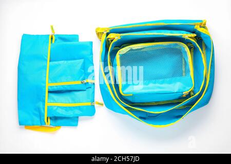 Set of travel organizers for belongings on white background Stock Photo