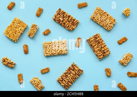 Crispy rice bars on color background Stock Photo