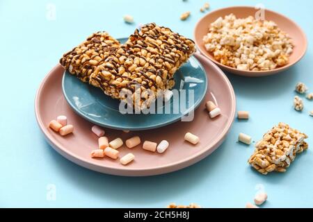 Crispy rice bars on color background Stock Photo