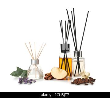 Different reed diffusers on white background Stock Photo