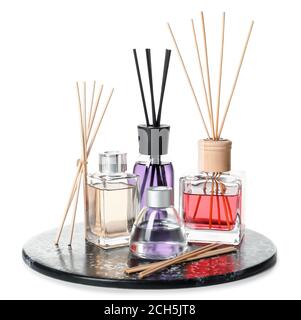 Different reed diffusers on white background Stock Photo