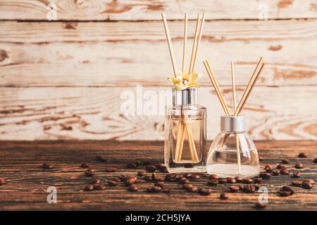 Different reed diffusers on table Stock Photo