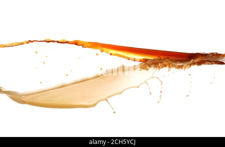 Splashes of hot coffee and milk on white background Stock Photo