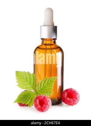 Bottle of raspberry essential oil on white background Stock Photo