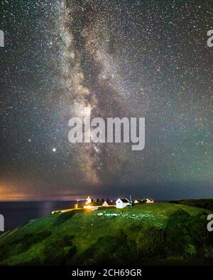 Anvil Point Lighthouse, Swanage, Dorset, UK.  13th September 2020.  UK Weather.  The galactic centre of the Milky Way glows brightly in the clear night sky above Anvil Point Lighthouse at Swanage in Dorset.  Picture Credit: Graham Hunt/Alamy Live News Stock Photo