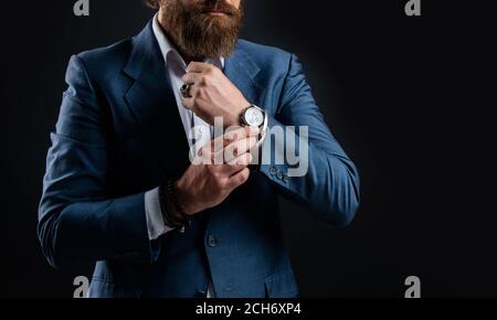 Wrist Watch On Businessman Hand Close Up. Man Is Checking Time Concept.  Stock Photo, Picture and Royalty Free Image. Image 150228691.
