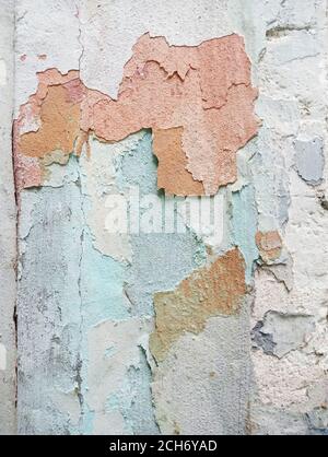 Texture colored old plaster with visible layers of paint. Stock Photo