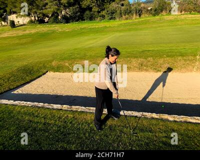 Golfer Playing on Golf Course in France. Stock Photo