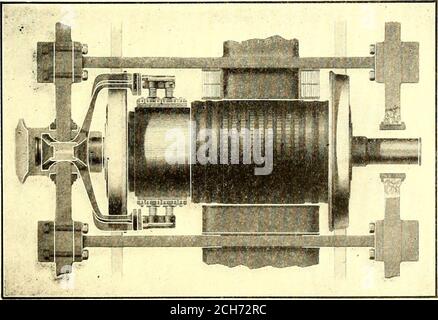 The rotating wheels of steam locomotive on railroad. Detail of steam ...