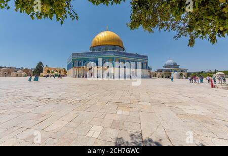 Jerusalem, Israel - People exploring the Dome of the Rock. It is an Islamic shrine located on the Temple Mount in the Old City of Jer Stock Photo