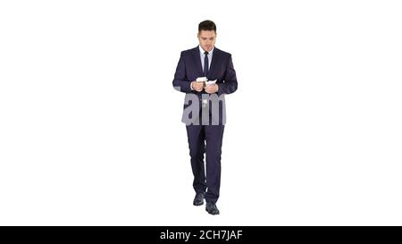 Man in suit walking and counting money on white background. Stock Photo