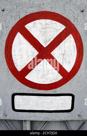 Grungy red and white clearway sign with cracks and peeling paint Stock Photo